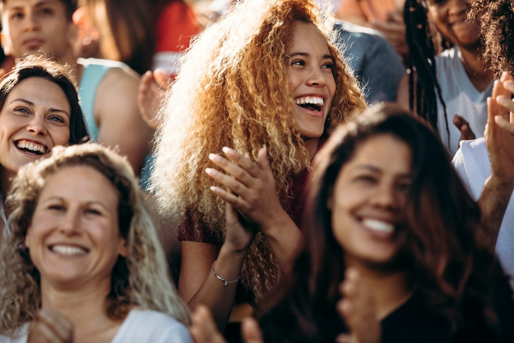 An audience applauding at an event